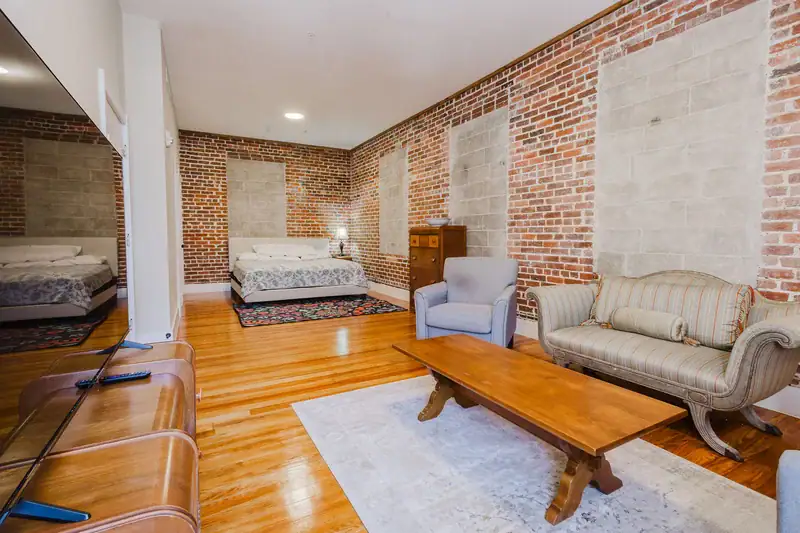 Apartment 303 bedroom with adjoining sitting area